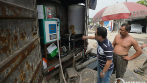 四川加油站老板群號是多少（加油站的老板）